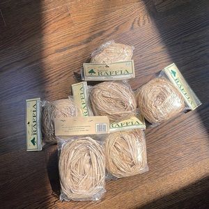 6 2 Oz bags natural raffia. New! Cleaning out my attic!